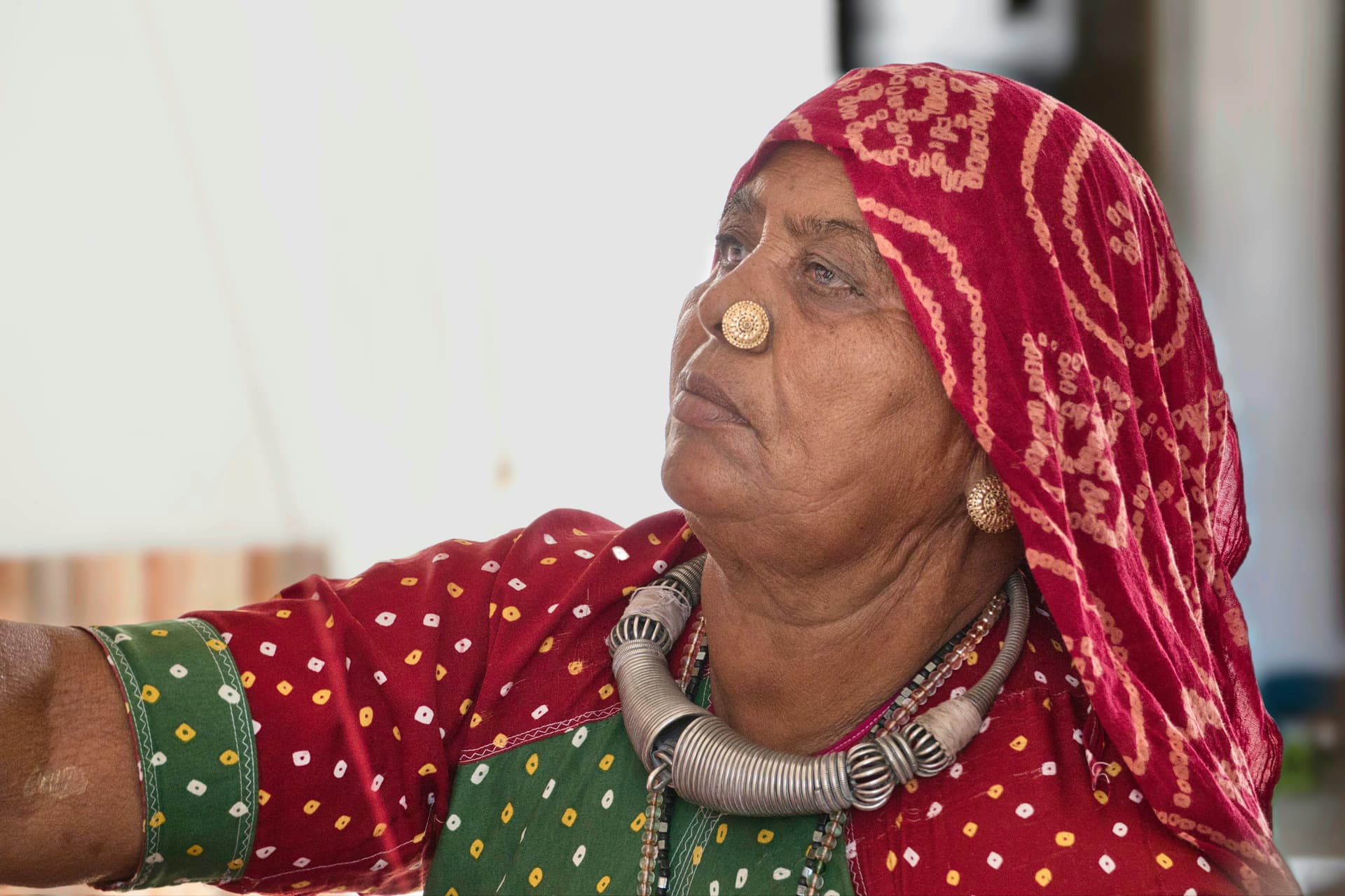 a man with a red headdress and a red headdress
